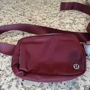 Burgundy Lululemon belt bag